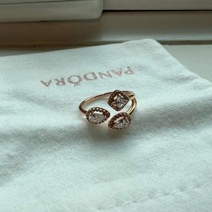 Authentic pandora ring in their rose gold. Hardly worn.